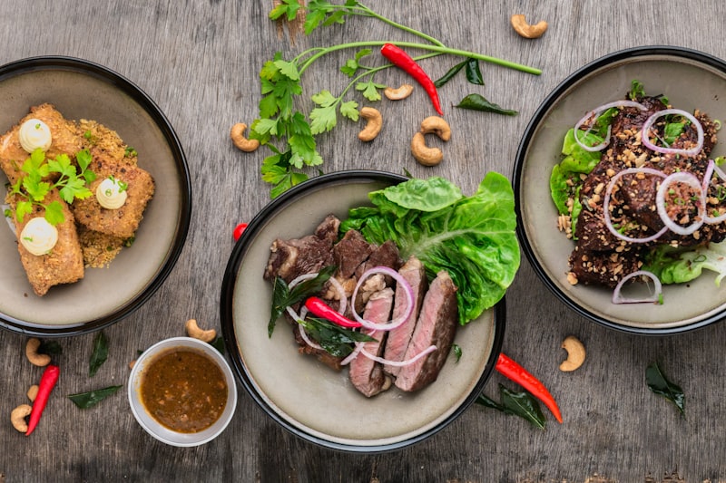 Paleo diet plate with meat, eggs and avocado
